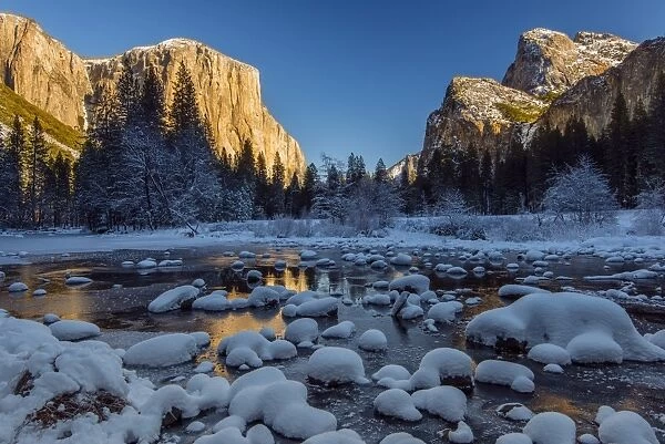 Winter landscape with iced river and El Capitan mountain behind, Yosemite National Park