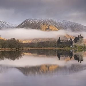 The abandoned ruin of Kilchurn Castle on a misty winter morning, Loch Awe, Argyll & Bute, Scotland