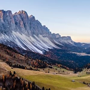 Aerial view of Odle peaks (Geisler gruppe) at sunrise, Funes valley, Dolomites, Italy