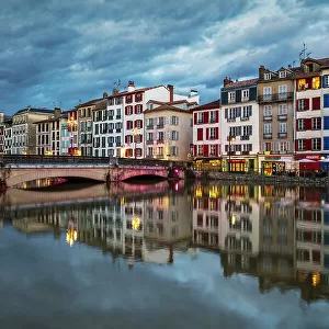 Basque houses reflected in the Nive, Bayonne, Pyrenees-Atlantiques, Nouvelle Aquitaine, France
