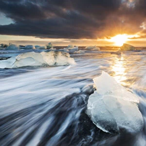 Blocks of ice at sunrise, Jokulsarlon, Diamond beach, Austurland, Iceland