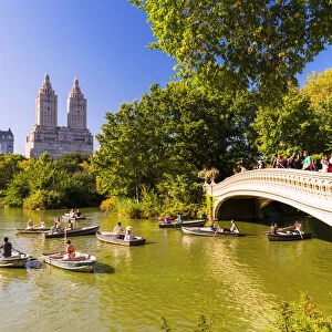 Boats on the Lake and Bow bridge in Central park, New York, USA
