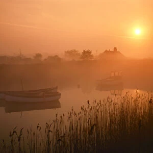 Boats on River Alde at Sunrise, Snape, Suffolk, England