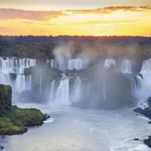 Brazil, Parana state, sunrise over the Iguacu or Iguazu falls as photographed