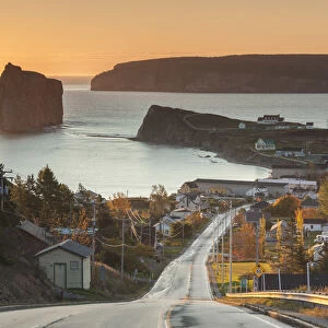 Canada, Quebec, Gaspe Peninsula, Perce, elevated view of town and Perce Rock from Rt 132