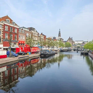 Canal with market and town hall at Leiden, South Holland, The Netherlands