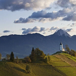 Church of St. Primoz with the Kamnik-Savinja Alps beyond, Gorenjska, Slovenia