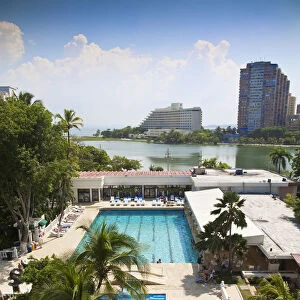 Colombia, Bolivar, Cartagena De Indias, Bocagrande, Hotel swimming pool with Hilton