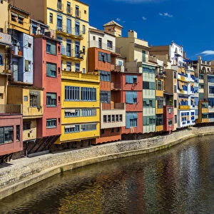 Colorful buildings along the banks of River Onyar in Girona, Catalonia, Spain