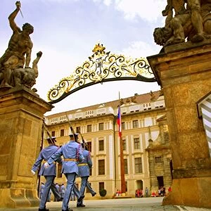 Czech Republic, Prague; A Castle Guard in uniform holding his post at the gate