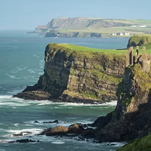 Dunluce Castle on the cliff tops of the Causeway Coast, County Antrim, Northern Ireland. Autumn (November) 2022