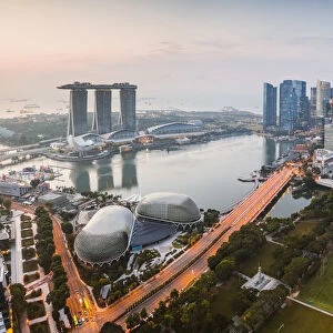 Elevated view of business district and Marina bay Sands at sunset, Singapore