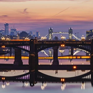 England, London, Southwark, London Bridge City, Reflections of Thames Bridges at Dawn