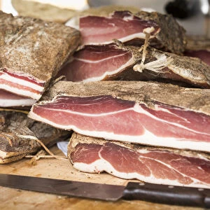 a detail of the famous Speck, a typical south tyrolean food, Bolzano province, South