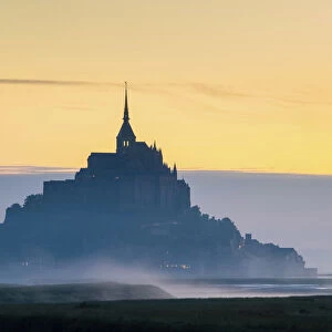 France, Normandy (Normandie), Manche department, Le Mont-Saint-Miichel silhouetted