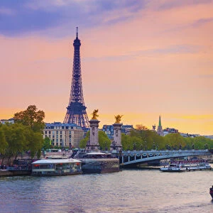France, Paris, Eiffel Tower and River Seine at dusk
