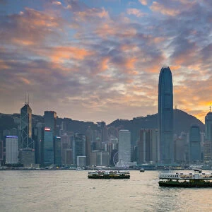 Hong Kong skyline, skyscrapers on Hong Kong Island skyline at sunset seen from Tsim