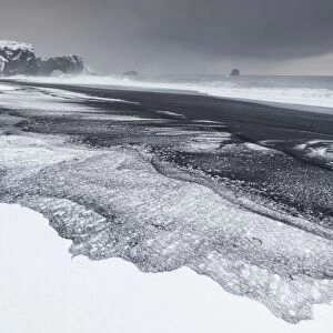 Iceland, South Iceland, Dyrholaey, Snowy beach of Dyrholaey