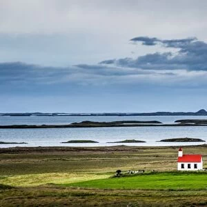 Iceland, Westfiords and lonely church in the green landscape