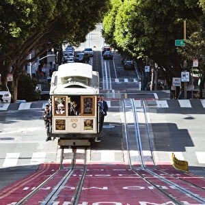 Iconic cable car in the streets of San Francisco, California, USA