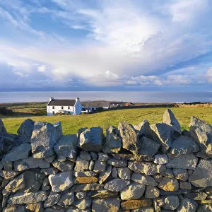 Ireland, Co. Donegal, Fanad, House and stone wall