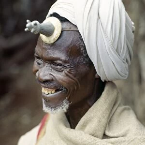 A Konso man wears a phallic Kallaacha on his forehead