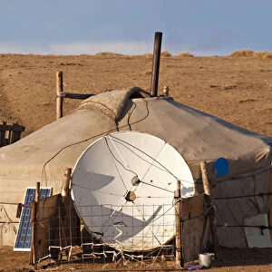 Mongolia, Bayangobi, A nomads traditional Ger with satellite dish and solar panel