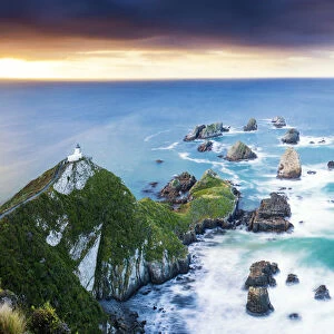 Nugget Point Lighthouse at Sunrise, New Zealand