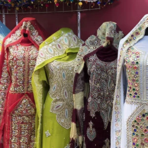 Ornate dresses for sale in Mutrah souk, Muscat, Oman