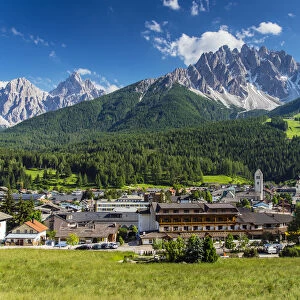 Panoramic view over San Candido Innichen with Dolomites behind, Alto Adige or South Tyrol