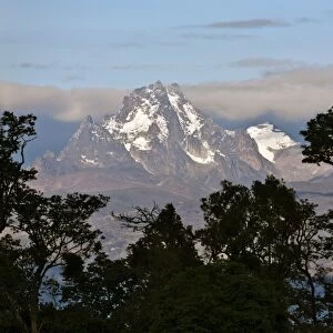 The peaks of Mount Kenya from the Aberdare National Park. Mount Kenya is Africas second highest mountain rising to a height of