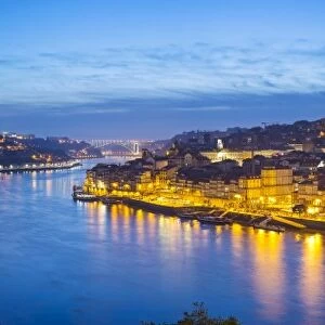 Portugal, Douro Litoral, Porto. Dusk in the UNESCO listed Ribeira district