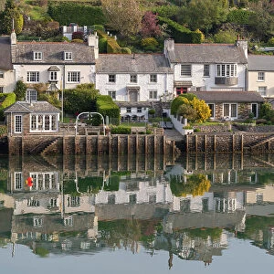 Pretty cottages on the estuary in the South Hams village of Newton Ferrers, Devon, England. Spring (April) 2022
