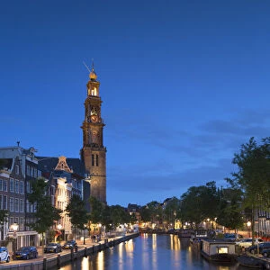 Prinsengracht canal and Westerkerk at dusk, Amsterdam, Netherlands