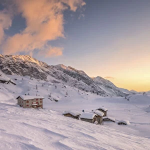 The refuge Cristina at sunset in a winter day at the Alpe Prabello, Prabello Alp in