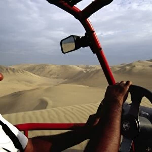 Riding in the front seat of a dune buggy