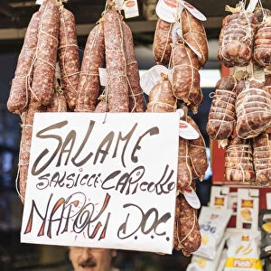 Salami and cured hams for sale at stall, Naples, Italy, Europe
