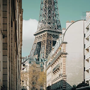Section of the Eiffel Tower seen from the streets of Paris, France