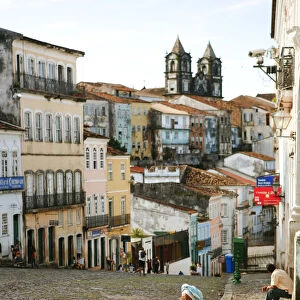 South America, Brazil, Bahia, a Baiana woman looking out over the Pelourinho in the