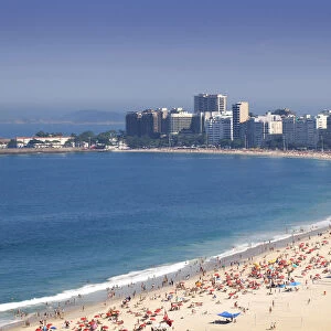 South America, Brazil, Rio de Janeiro, general view of Copacabana Beach showing hundreds