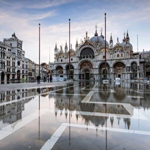 St Marks square flooded by high tide (Acqua alta), Venice, Italy