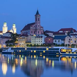 St. Pauls church & St. Stephans Cathedral illuminated at dusk, Passau, Lower Bavaria