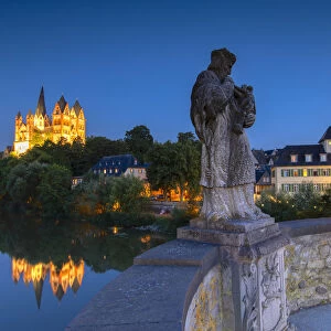 Statue on Old Lahn Bridge (Alte Lahnbrucke), Cathedral (Dom) and River Lahn at dusk