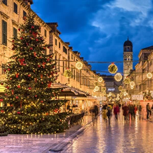 Stradun pedestrian street adorned with Christmas lights and decorations, Dubrovnik