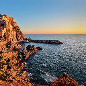 Sunset on Manarola, municipality of Riomaggiore, National Park of Cinque Terre, La Spezia province, Liguria district, Italy, Europe