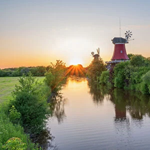 Sunset at the Twinmills of Greetsiel, Krummhorn, East Frisia, Lower Saxony, Germany