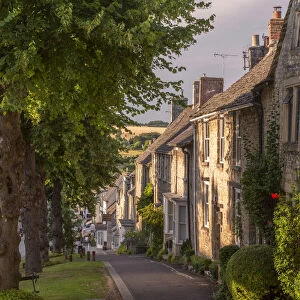 Terraced cottages along The Hill in the Cotswolds town of Burford, Oxfordshire, England