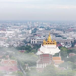 Thailand, Bangkok, The Golden Mount (Phu Khao Thong) at Wat Saket shrouded in fog