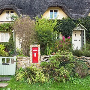 A thatched cottage in Lacock village, Wiltshire, England