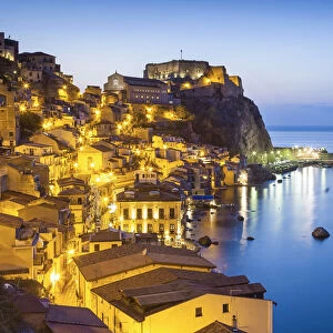 Town View at dusk, with Castello Ruffo, Scilla, Calabria, Italy